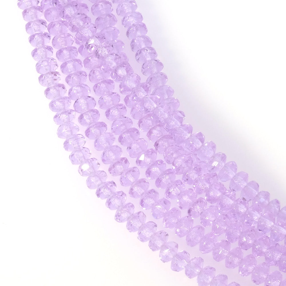 Fil de perles de Bohème Donuts facetté 2x3mm violet pastel transparent