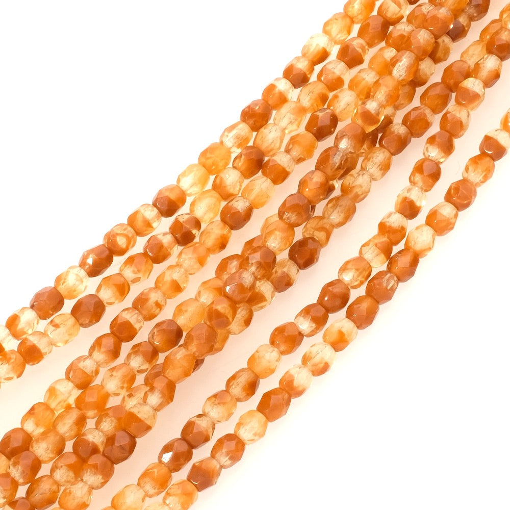 Fil de perles de Bohème rondes facettées 4mm caramel transparent