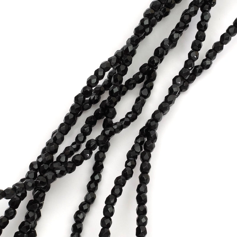 Fil de perles de Bohème rondes facettées noir opaque 2mm